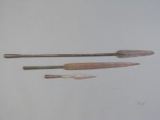 Three 19thC spear heads of Mahoi/Sudanese/Zulu style, blade lengths 15cm with barbed shaft,