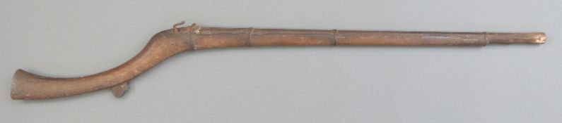 Afghan Jezail matchlock camel gun with brass with four iron bands,