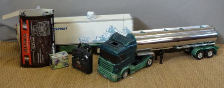 A large scale remote controlled lorry with Polar Express trailer and chromed tanker together with a