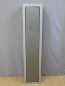 A gun cabinet / safe and keys.