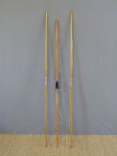 Three various wooden archery bows two handmade with leather bound grips.