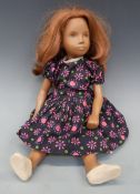 An English Sasha doll with auburn hair, in cotton floral dress, unmarked,