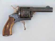 Ten shot blank firing revolver with folding trigger, chequered grips and 2.