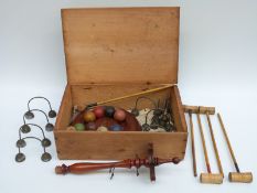 A vintage table croquet set, the mallets with turned boxwood heads on circular stand,