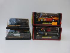 Four Scalextric electric model racing cars, Lotus 77 C126, March Ford C131,