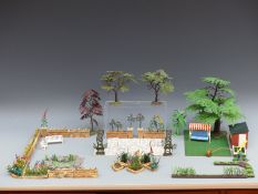 A collection of Britains Floral Garden buildings,