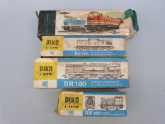 Four PIKO HO/00 gauge diesel locomotives comprising V180, BR150, BR120 and BR110,