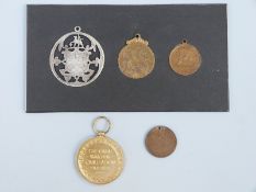 A silver pierced medal awarded to Pte E Appleyard South Africa War 1902, a WWI medal Pte.