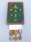 WWI group of three medals with Royal Artillery badges awarded to 1423 S.Sth. S C Payne RFA (S.