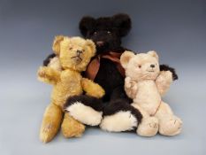 Three vintage teddy bears including a golden mohair example