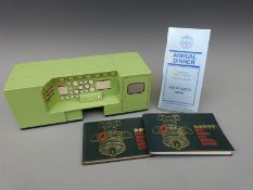 A metal desk top tidy in the form of a Dowty Fuels Systems test rig control panel,