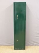 A gun / ammunition cabinet and keys.