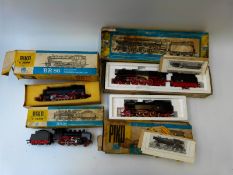 Four PIKO HO/00 gauge locomotives comprising BR015, BR86, BR66 and BR24, all in original boxes.