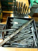 A quantity of reamers including a graduated set on stand