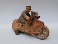Louis Marx & Co clockwork tinplate Police Department police officer riding a motorbike with front