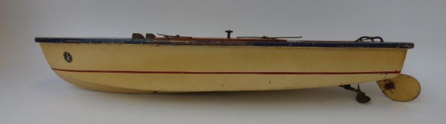 A wooden battery operated model of a vintage speedboat, 54cm long.