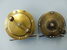 Two brass fishing reels,