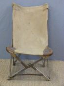 A canvas folding chair, named to rear R S Grover R. A.