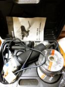 A cased angle grinder