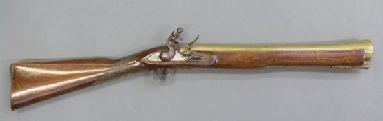 Henshaw flintlock hammer action blunderbuss with lock named Henshaw engraved with heart shaped