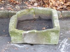 A D shaped carved natural stone trough (W67 x D69 x H22cm)