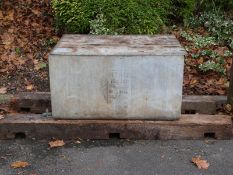 Two solid oak beams and a galvanised water tank