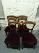 A set of four Victorian mahogany balloon back chairs