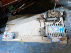 ½ horsepower electric motor and gearbox on base