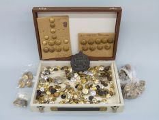 A quantity of mainly crested buttons,