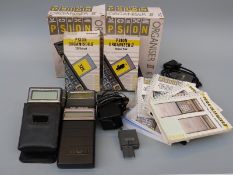 Four vintage Psion organisers and accessories including Organiser II CM, XP and LZ64, Data Pack,