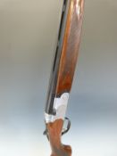 Beretta 687 Silver Pigeon 12 bore over and under ejector shotgun with bird scenes engraved to the