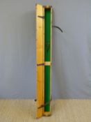 A pine metal and leather bound lockable archery or fishing rod case with folding metal handle,