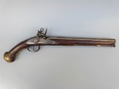 Italian flintlock hammer action holster pistol with engraved dragon to the brass trigger guard,