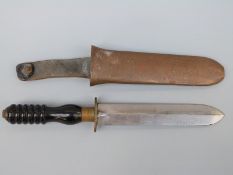 Gorman diver's knife with serrated blade.