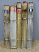 Five boxes of various archery arrows.