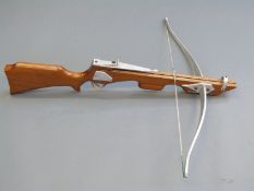 Unnamed crossbow with wooden stock and steel mounts