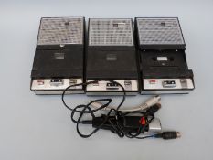 Three Philips portable tape recorders together with a Philips microphone