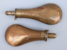 Two copper and brass powder flasks,