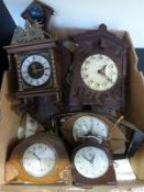 Five clocks to include a Russian bakelite example and Dutch style Zaandam clock