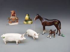 Beswick pigs and horses, Royal Doulton bird group,