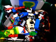 Over 6kg of loose Lego parts together with a Lego table.