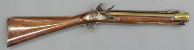 Henry Nock of London flintlock hammer action blunderbuss with 13 inch sprung bayonet, named lock,