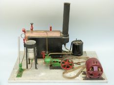 Stuart Turner S50 or similar horizontal live steam stationary engine on base with Stuart gas fired