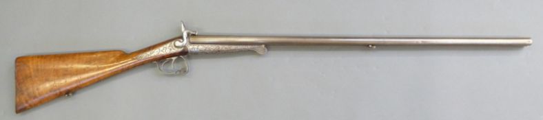 Emile Bernard 16 bore side by side pinfire hammer action shutgun with heavily engraved locks named