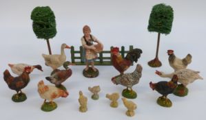 Approximately twenty Elastolin farm animals, figures and scenery.