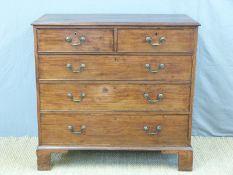 A Georgian mahogany chest of two over three graduated drawers raised on bracket feet (H105 x W110 x