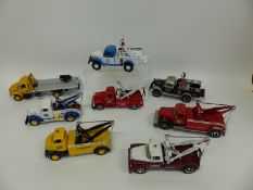 Eight First Gear diecast model American recovery trucks including Civil Defence, Brush Fire Unit,