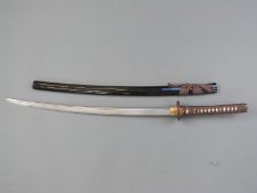 A Samurai sword with decorated guard and lacquered scabbard, blade length 72cm,