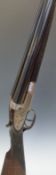 Williams & Powell 12 bore side lock shotgun with named and engraved locks,