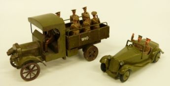 Two Tommy Atkins diecast WWI vehicle and soldier sets comprising German staff car and two